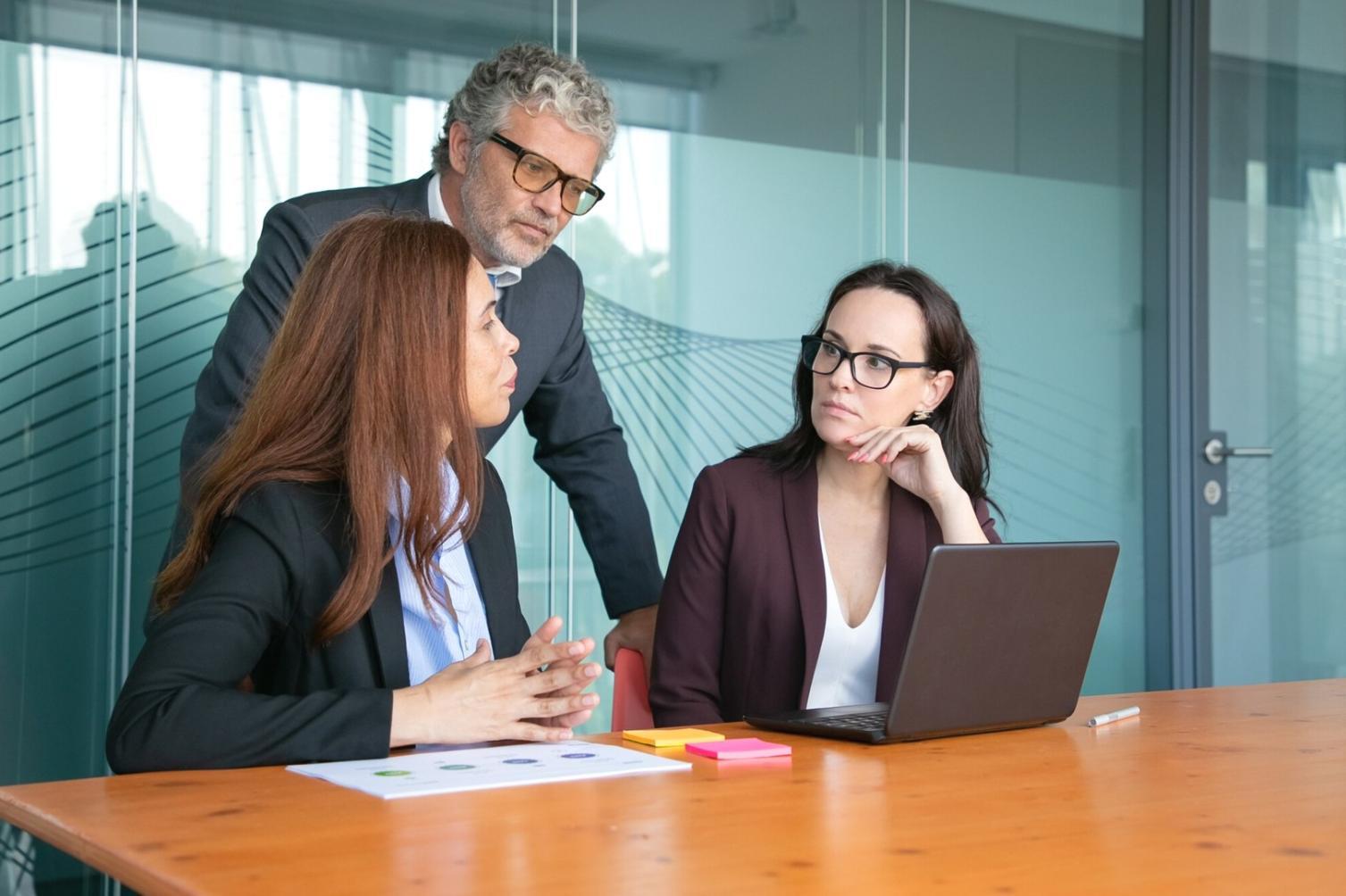 Business owner reviewing monthly expense reports and budget allocations